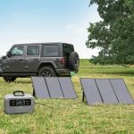 a jeep is parked next to a solar panel