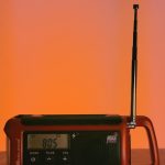 brown and black radio on white table