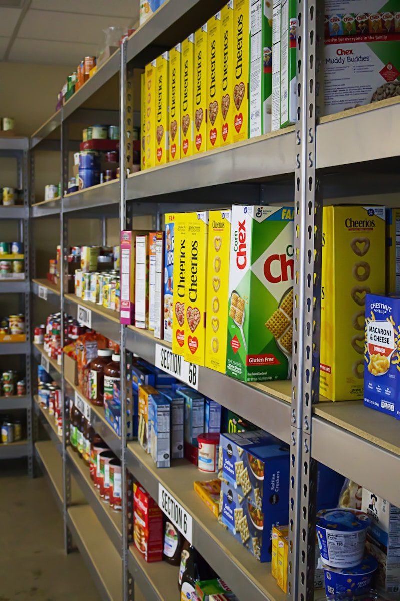 A shelf in a store filled with lots of food